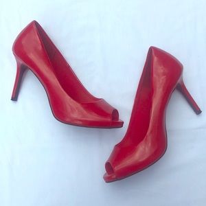 Red open toe pumps